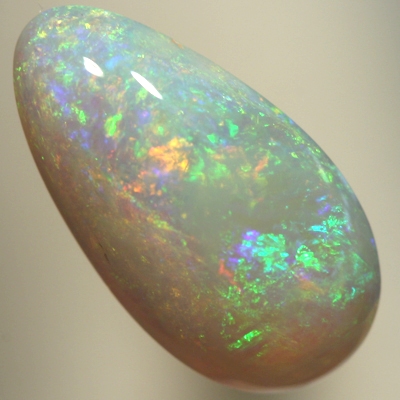 SOLID SEMI BLACK OPAL 3 D play of colour with sparkles of orange and green